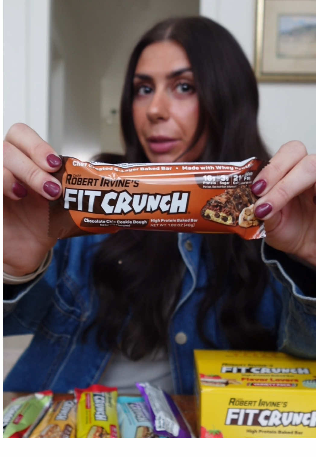 TikTok post by @cam.price18 for FITCRUNCH. Caption reads: @FITCRUNCH my new go-to protein bar! Shop their....