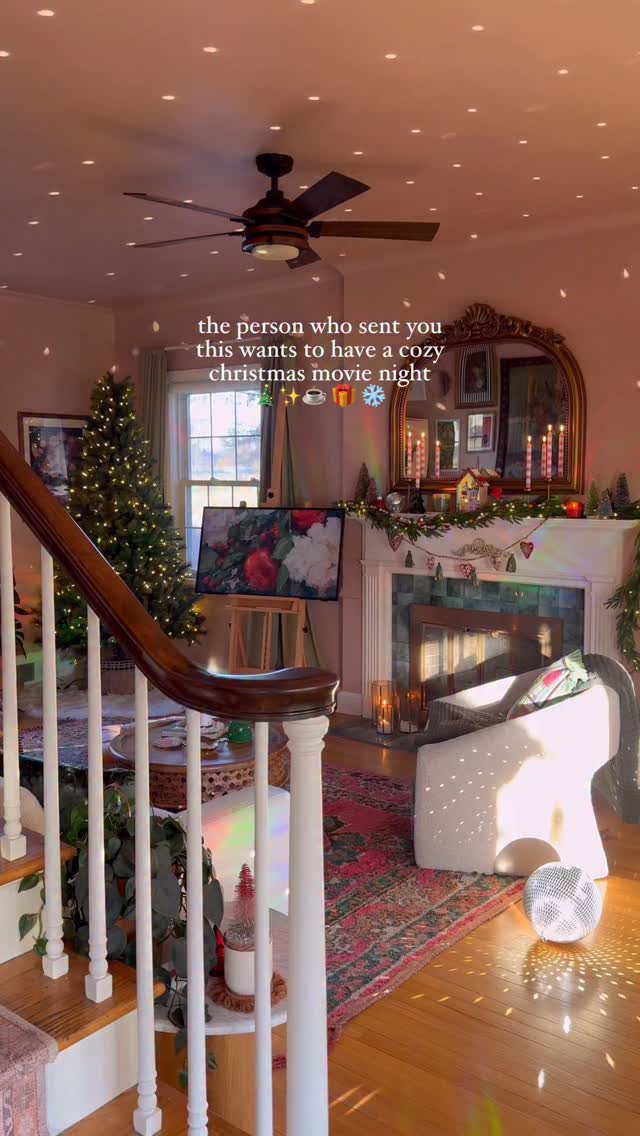 Instagram post by @goldenhourabode for World Market. Caption reads: cozy christmas movie nights are always the way to....