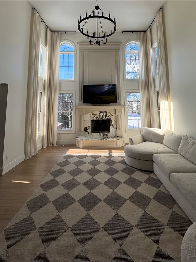 Instagram post by @homebyxi for Homerilla. Caption reads: [...] entire first floor with drapery from....