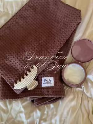 TikTok post by @shaniablackwell for Emi Jay. Caption reads: @Emi Jay dream créme is a little sweeter 🧸☁️🧦🍪....