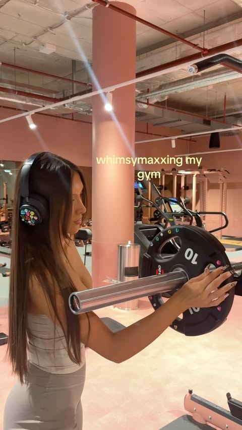 Instagram post by @dafinabeqi for AYBL. Caption reads: how to bedazzle your gym🎀*ad | Gym fit: @aybl....