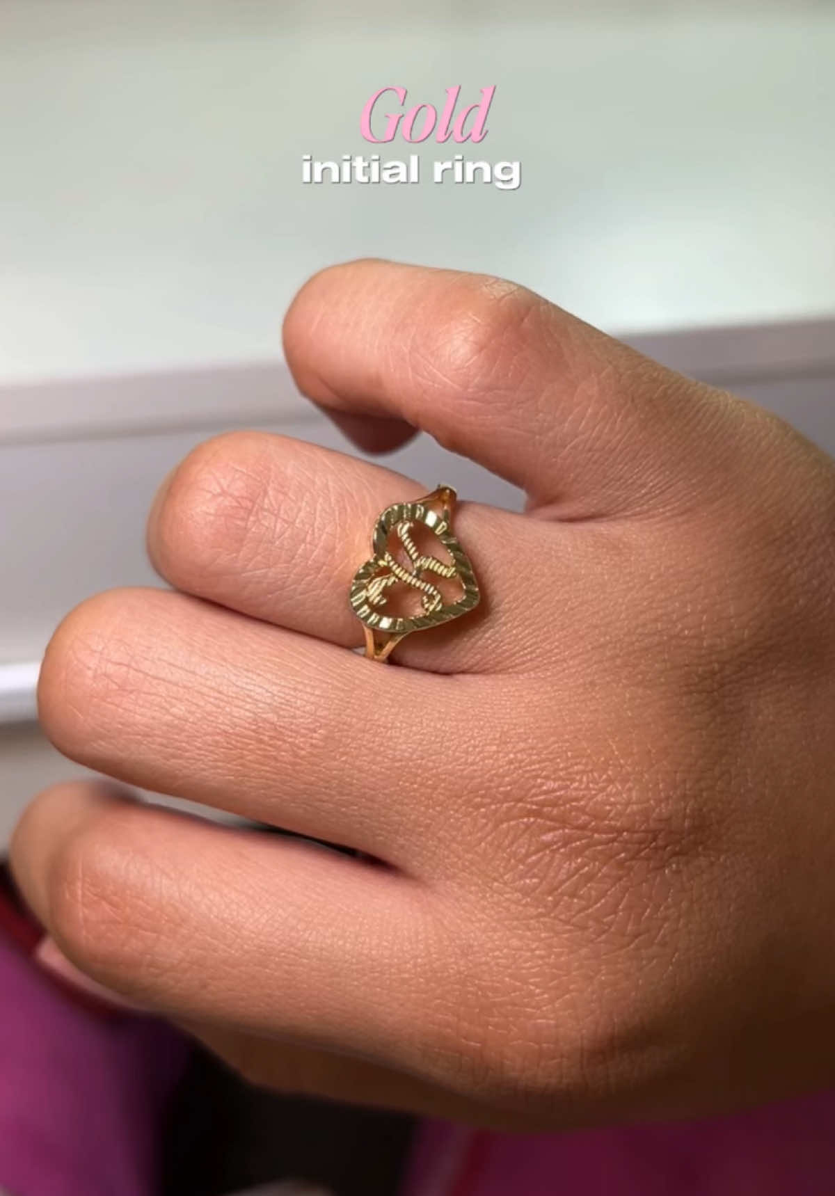 TikTok post by @aquariussed for Kissyan Jewelry. Caption reads: The prettiest little everyday ring 🥹✨ #goldring....