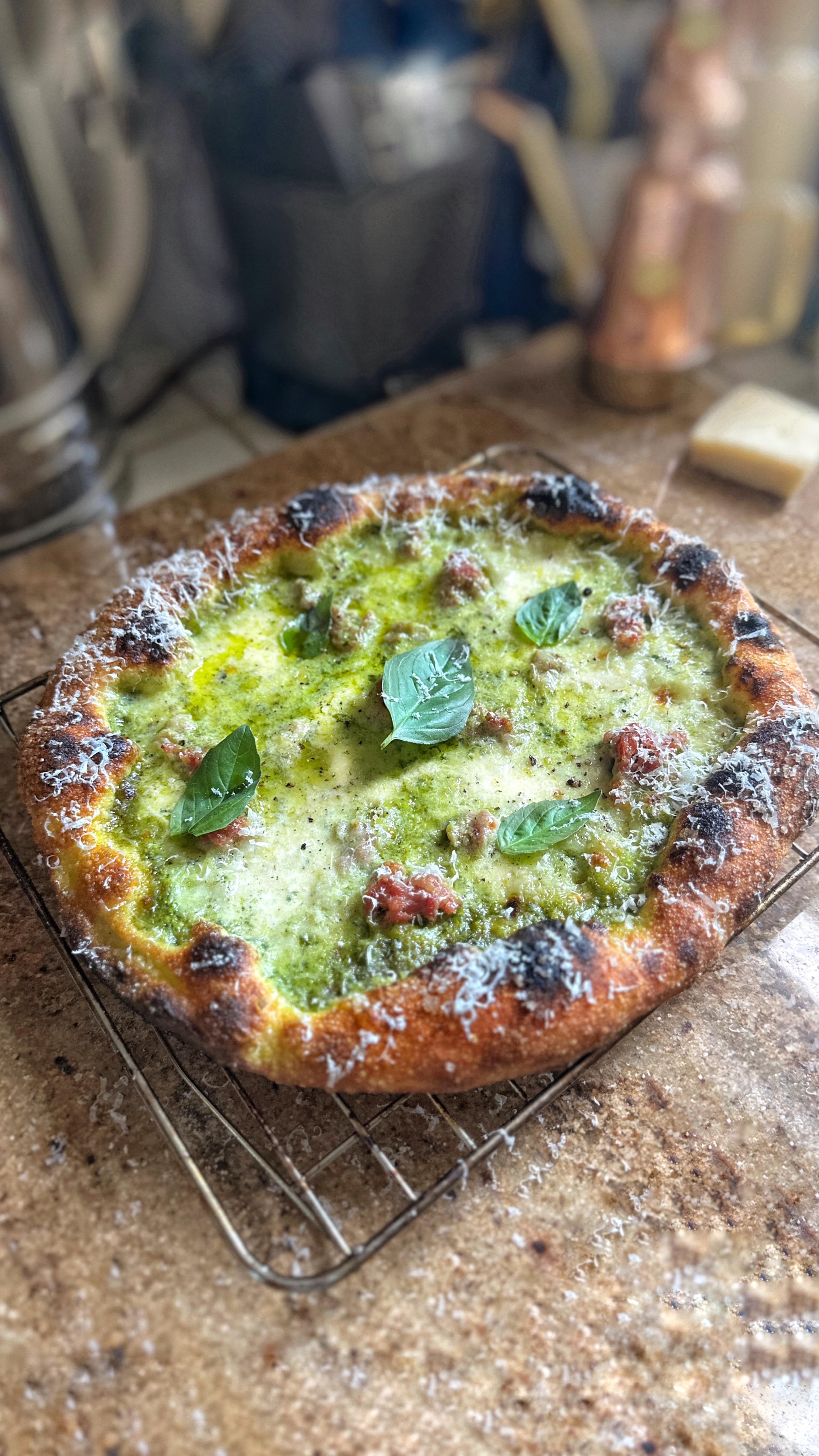 Instagram post by @dough_and_behold for Ooni. Caption reads: [...] for 5-6mins at 350°c in my @oonihq Volt.....