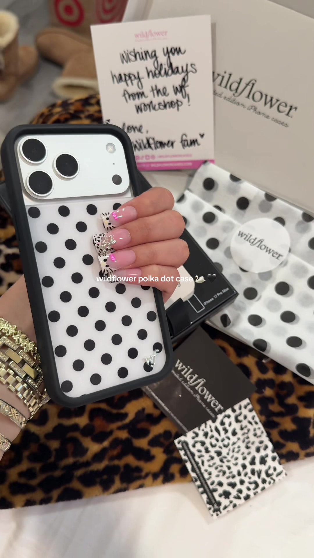TikTok post by @rashellthadoll for Wildflower Cases. Caption reads: [...] with polka dots🖤 @Wildflower Cases....