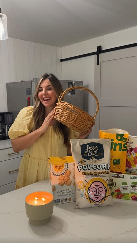 Instagram post by @gwendoline__dickerson for LesserEvil Snacks. Caption reads: [...] a little popcorn throwing 🤭💛 the....