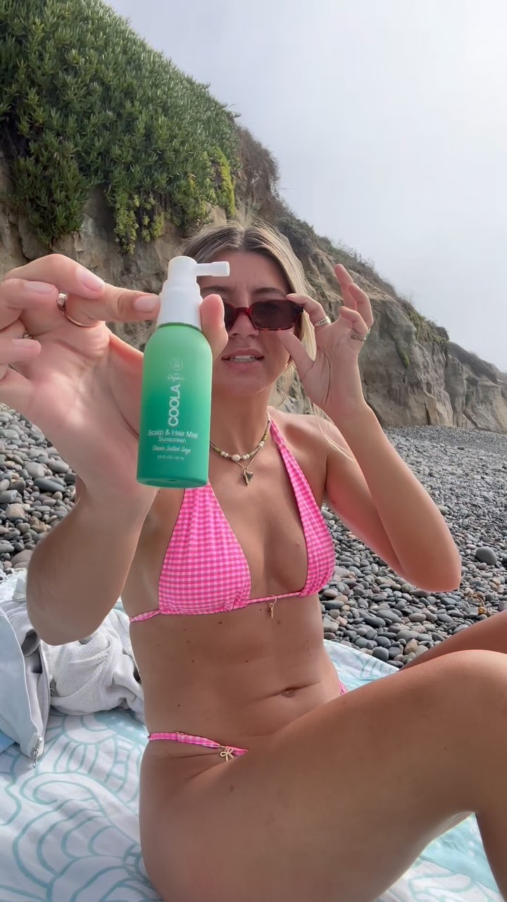 Instagram post by @ajcoastal for Coola. Caption reads: A much-needed beach rest day to rot on the beach.....