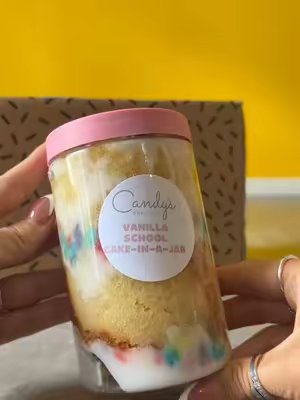TikTok post by @ashliejadexo for Candy's Cupcakes. Caption reads: [...] tasting cake I’ve ever had!!!🤍....