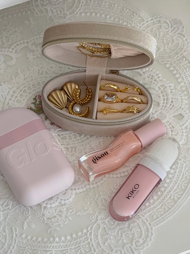 Instagram post by @dreamsofglow for Glossier. Caption reads: Essentials ✨💕🫶 *press samples shown #gisou....