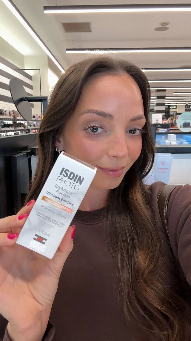Instagram post by @whitneykshepherd for ISDIN. Caption reads: Come with me to restock my fav @isdinusa Eryfotona....