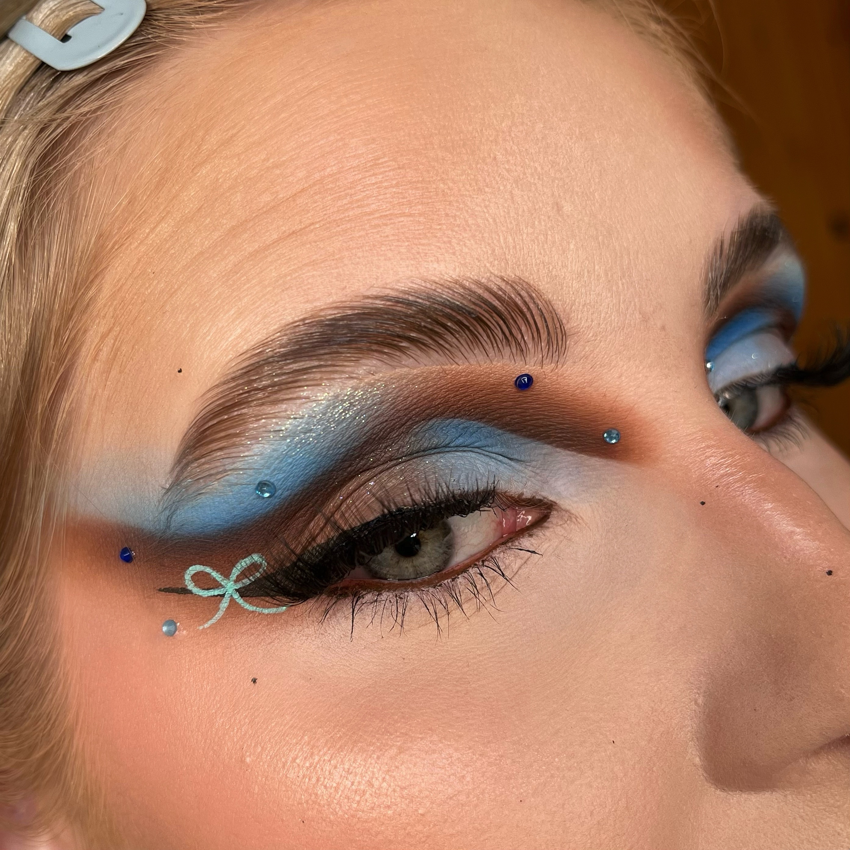 Instagram post by @meganwmua for Doll Beauty. Caption reads: [...] curve case in shade “coral” ,,....