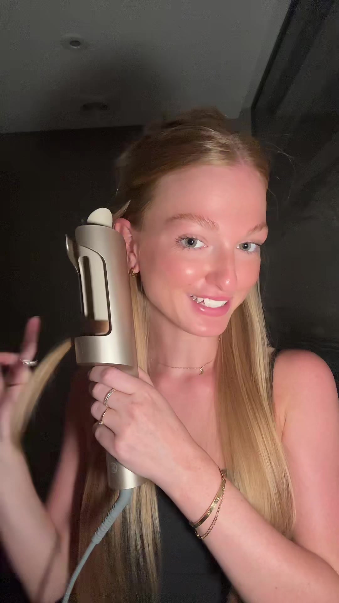 TikTok post by @amber.balota for TYMO Beauty. Caption reads: (Advertentie)| the best hairtool for bouncy curls....