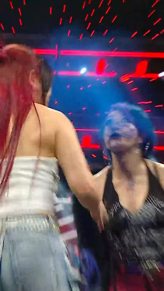Instagram post by @iyo_sky for WWE. Caption reads: What color is the SKY? 👀🤮.