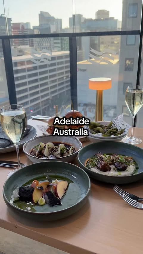 Instagram post by @__eeats for Crowne Plaza Hotels & Resorts. Caption reads: ADELAIDE… is this the ultimate date night spot?....