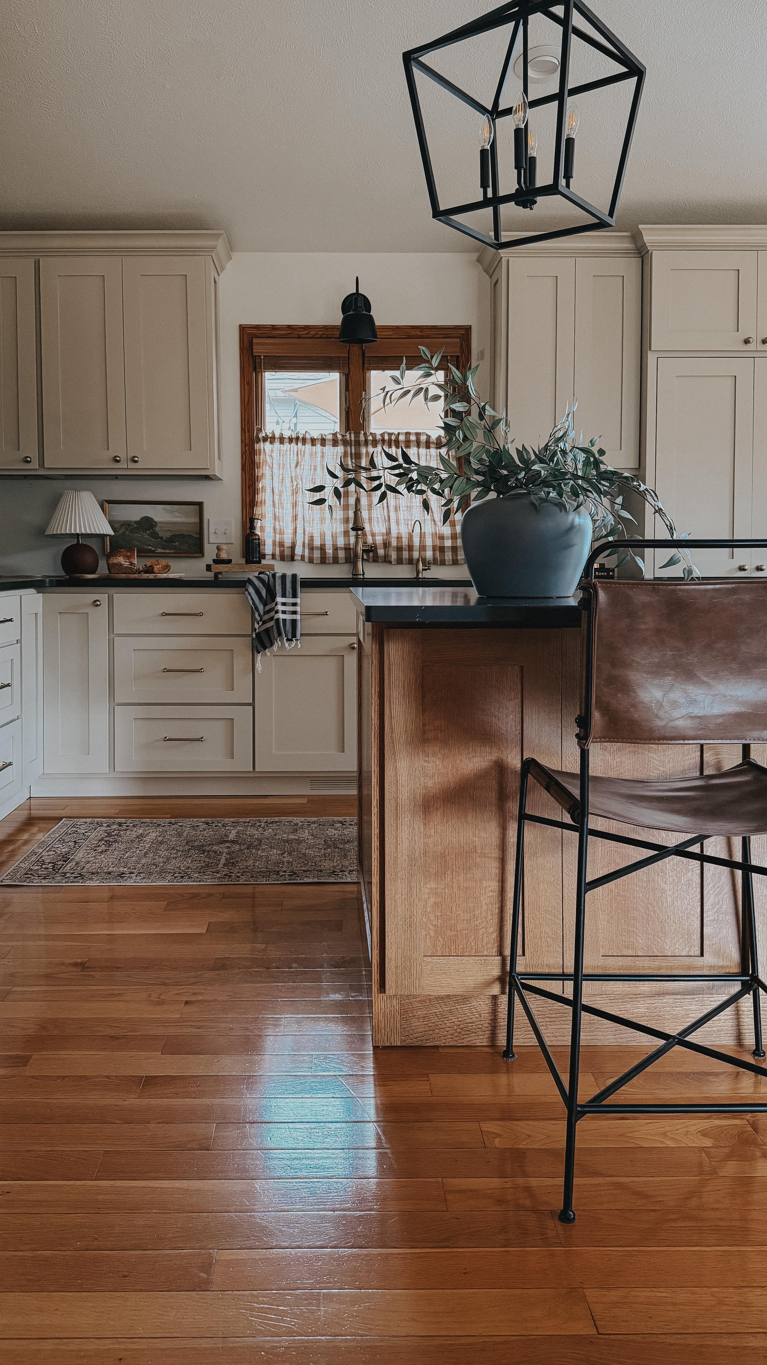 Instagram post by @rignellranch for Benjamin Moore. Caption reads: Kitchen Reveal! Recently, my Mom got her dream....