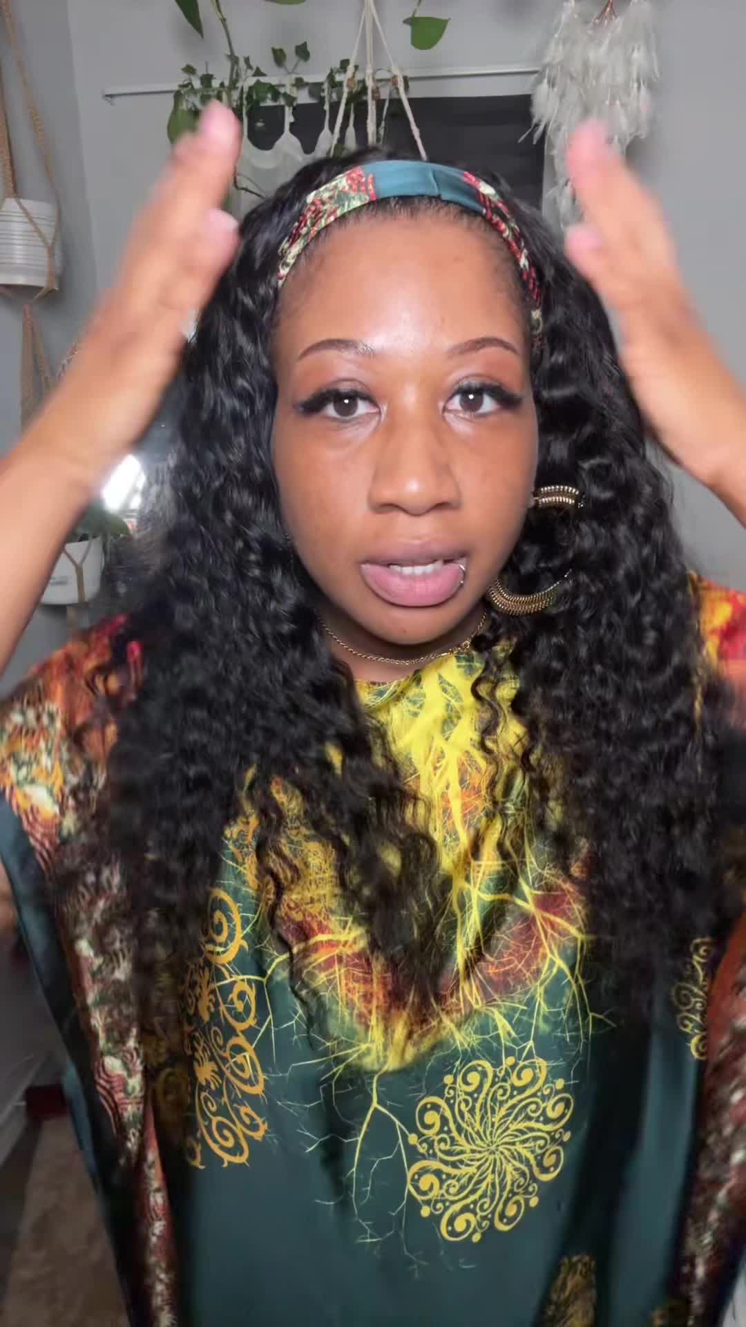 TikTok post by @rastastyleflowerchild for Bling Hair. Caption reads: [...] gorgeous Deep Wave Headband Wig from @Bling....