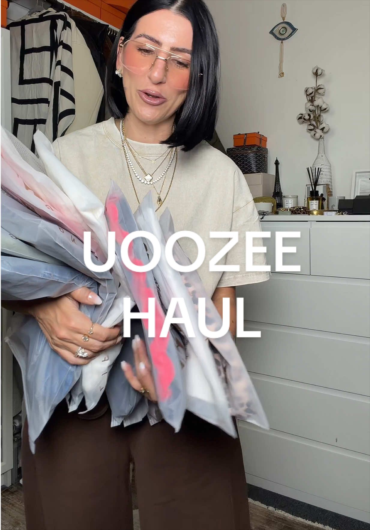 TikTok post by @nattythebratty for uoozee. Caption reads: Another @UOOZEE USA haul 🫣🥰 tysm @UOOZEE US....