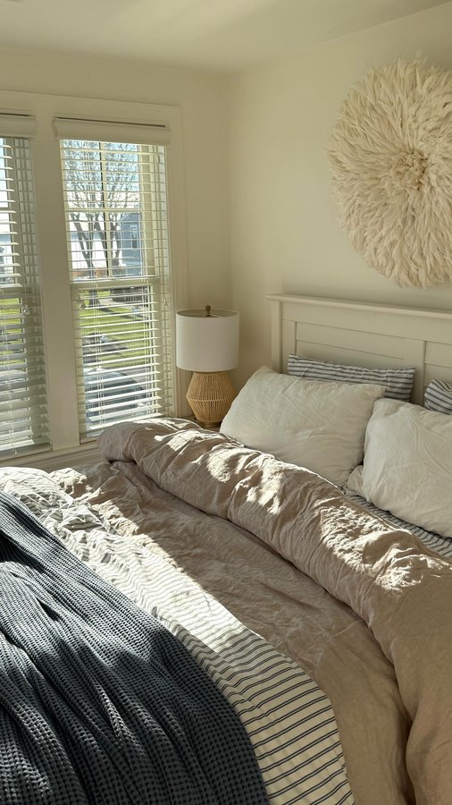 Instagram post by @gretchengeraghty for Brooklinen. Caption reads: setting up one of our guest rooms for girls....