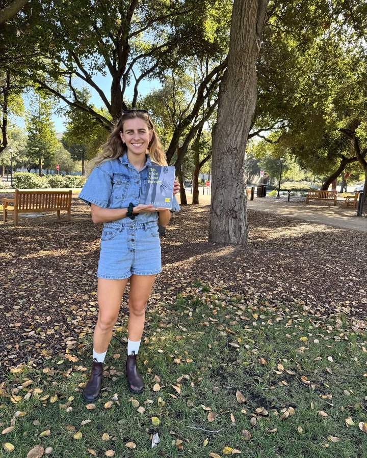 Instagram post by @runmarycain for HarperCollins. Caption reads: I can only describe holding an early physical copy....