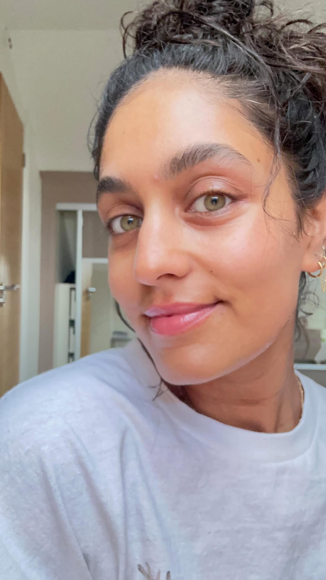 Instagram post by @radhidevlukia for DERMA•E. Caption reads: My everyday glowy dewy dumpling routine 🌝I love....