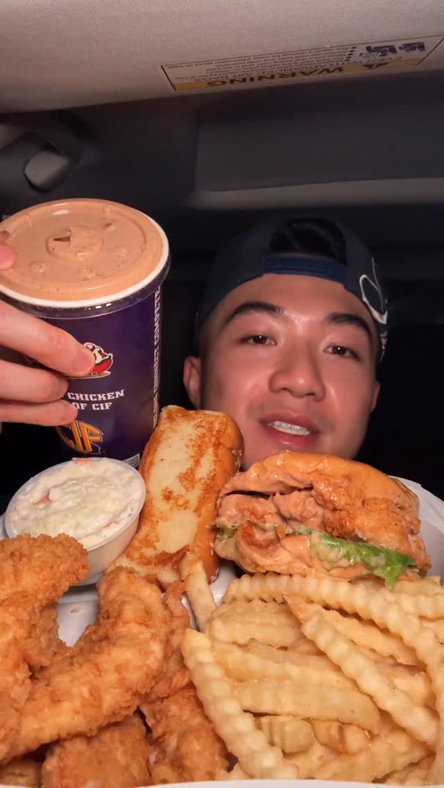 Instagram post by @dlameats for OLIPOP. Caption reads: Canes Rizzing with @drinkolipop 

#mukbang #viral....