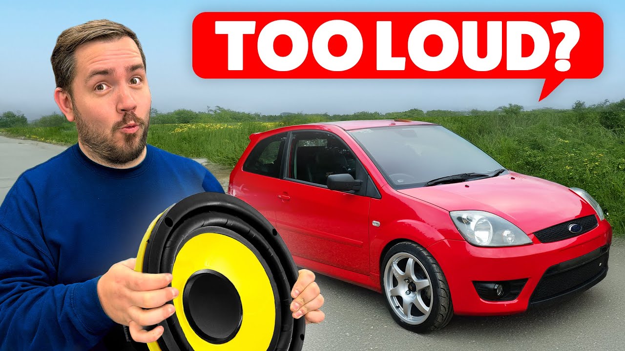 YouTube post by @TopDeadC for carVertical. Caption reads: I Fitted a £3000 Sound System To My First Car.