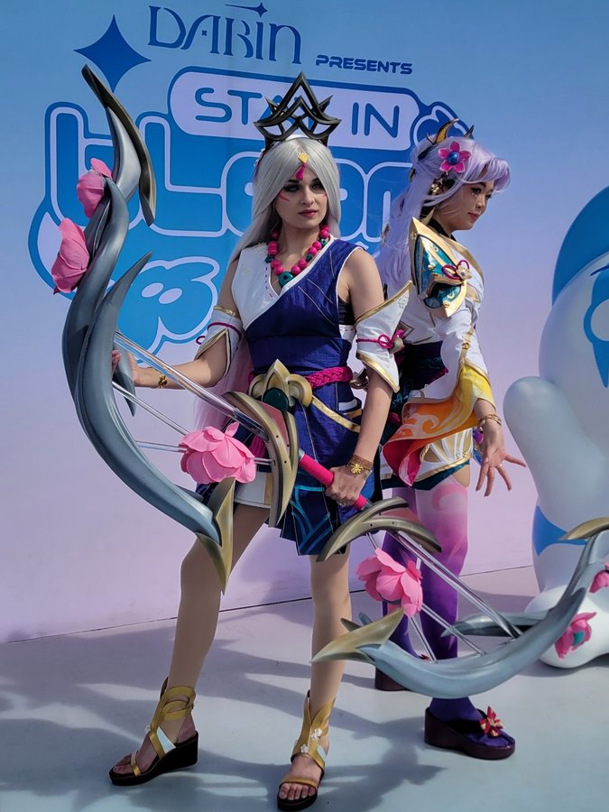 Instagram post by @kyasarin.cosplay for League of Legends. Caption reads: [...] #stayinbloomfestival ! Thank you....