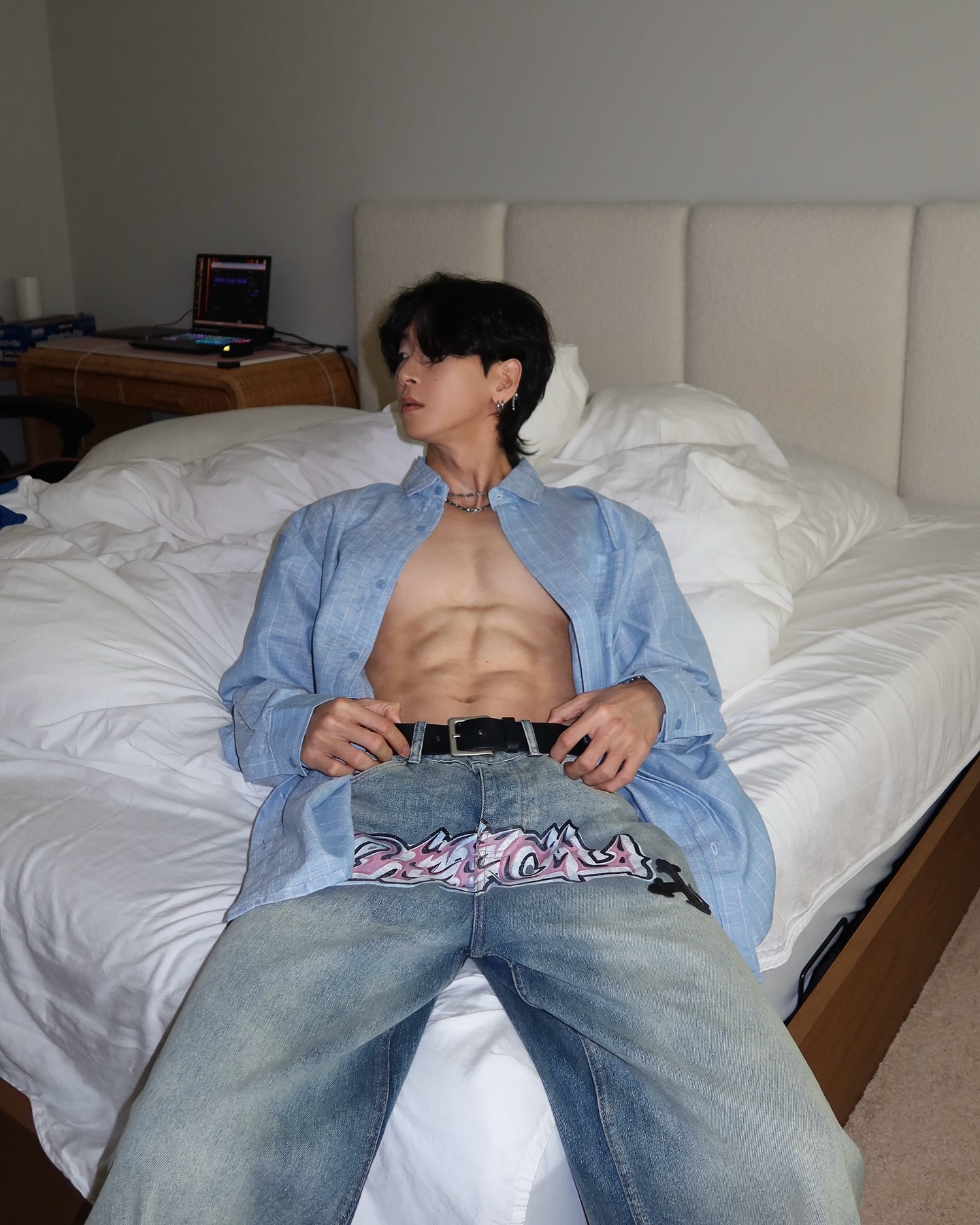 Instagram post by @_jjang.e for Boohooman. Caption reads: #ad Blue🦋
Shirt and Jeans from @boohoomanofficial.