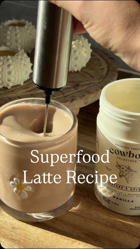 Instagram post by @dr.marleyquinn for Cowboy Colostrum. Caption reads: [...] free espresso over ice 3 scoops....