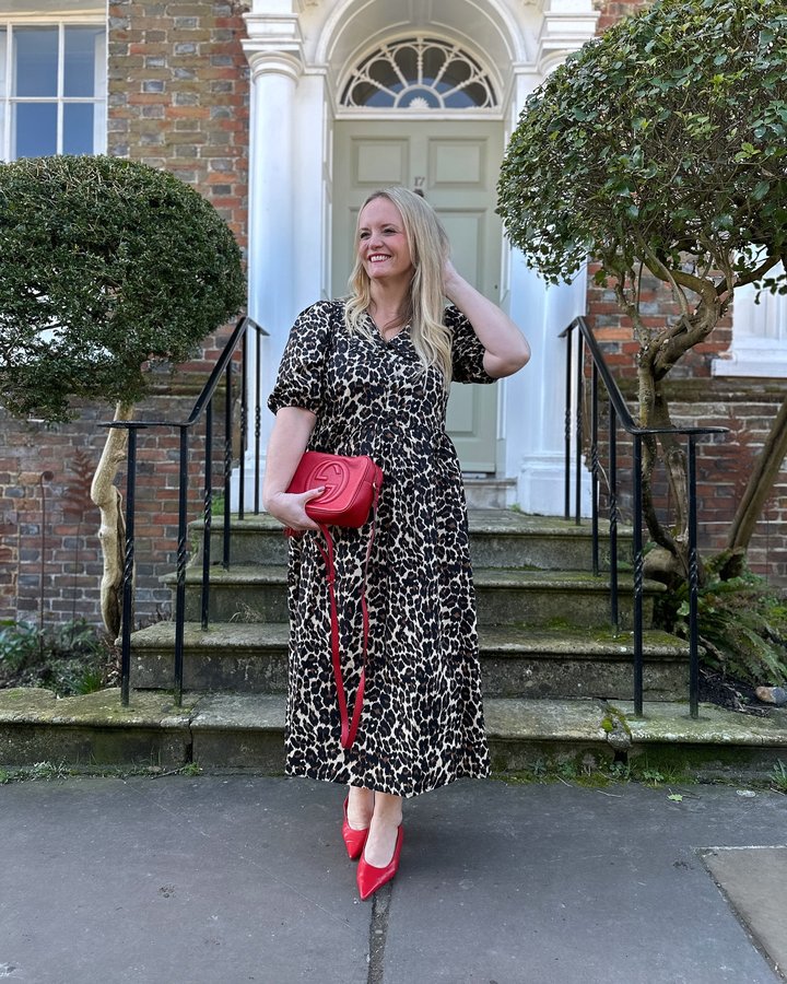 Instagram post by @caroline.wears for Baukjen. Caption reads: [...] Organic Cotton Printed Midi Dress from....
