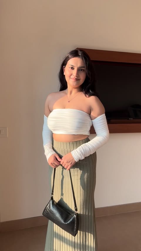 Instagram post by @garimasarraf224 for NEWME. Caption reads: [...] size - S
Top size recommended-....