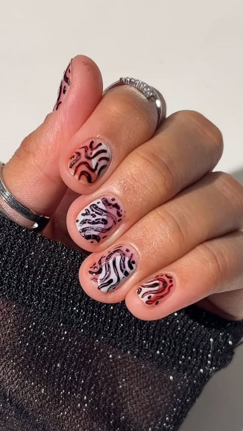 Instagram post by @nonnailartist for Sally Hansen. Caption reads: 🤔🤔 crackle nail art??? did it work?? do you like....