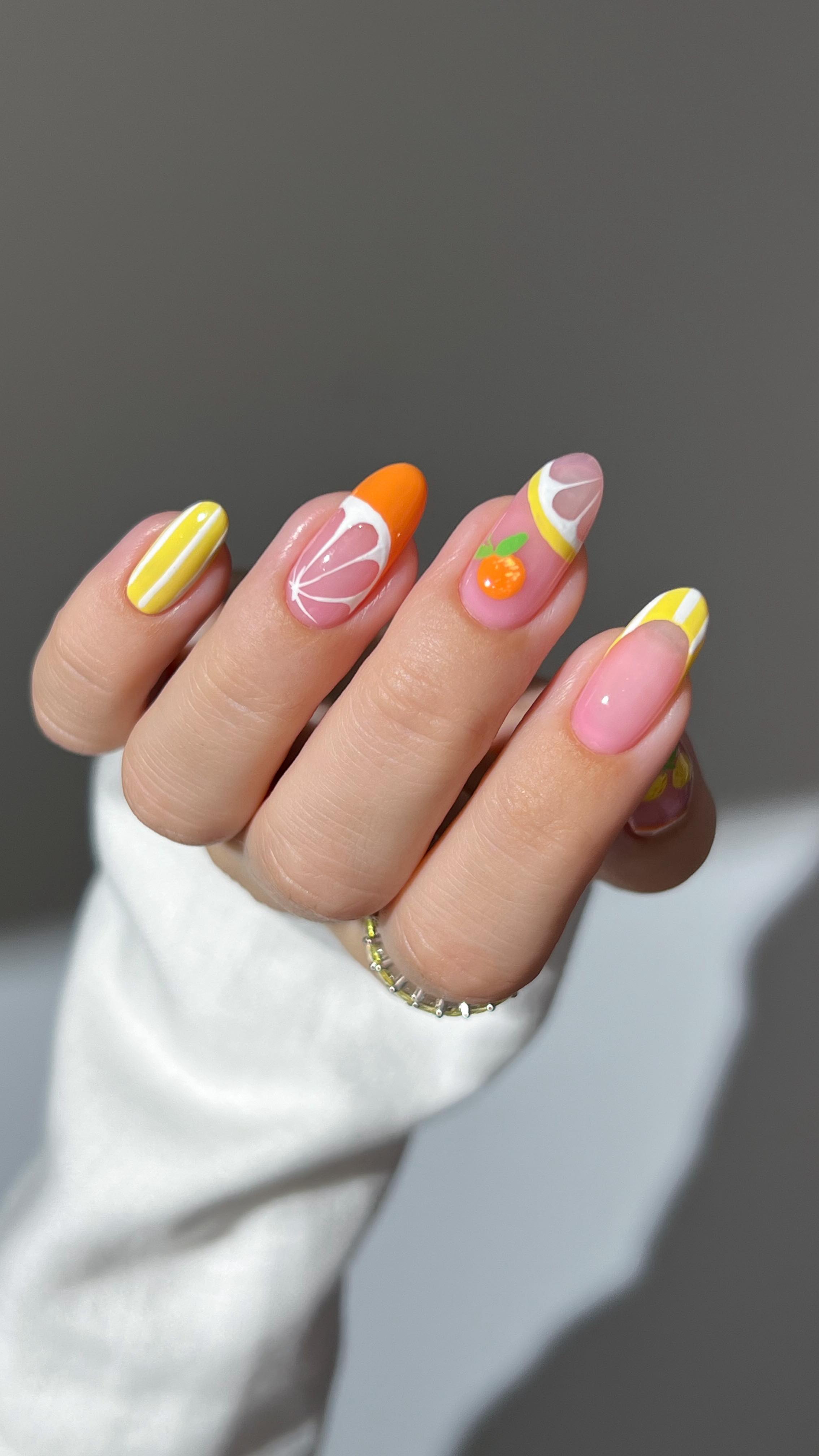 Instagram post by @heygreatnails for Essie. Caption reads: 🍊⛱️ the new @essie summer Riviera Rush collection....