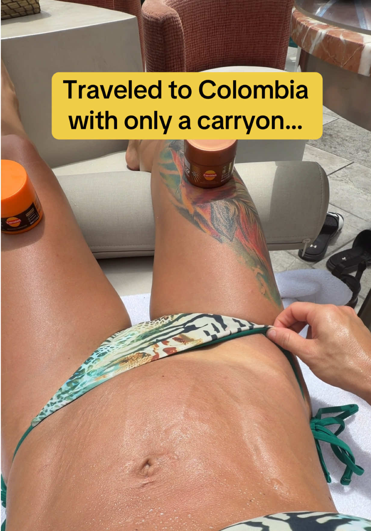 TikTok post by @evaangelina.shoptv for Carroten Greece. Caption reads: Booked a flight to Medellin with a super tight....