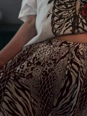 TikTok post by @lovedbyvictoriaaa for UEU. Caption reads: [...] #zebraprint #linenpantsoutfit #falloutfit....