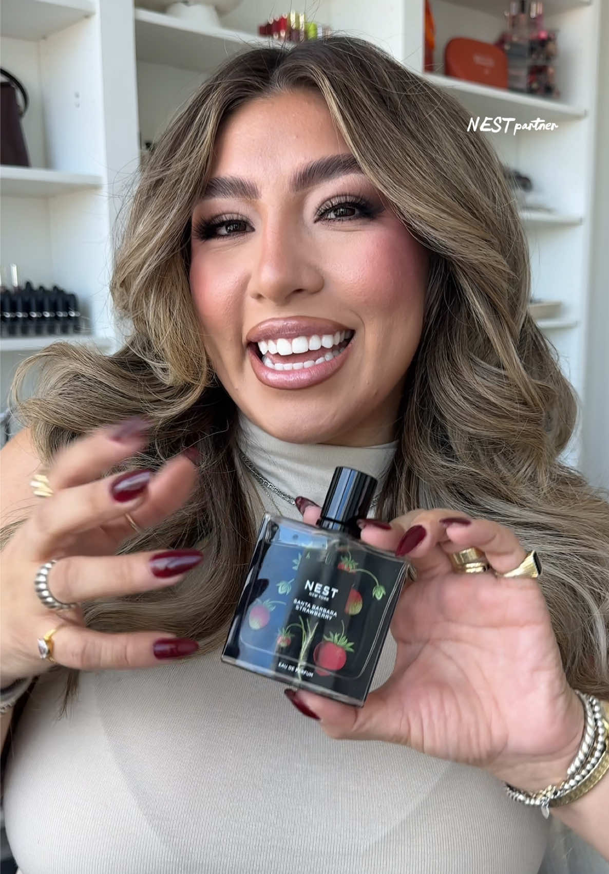 TikTok post by @alexisjuliaa for NEST New York. Caption reads: [...] next favorite fragrance combo with @NEST New....