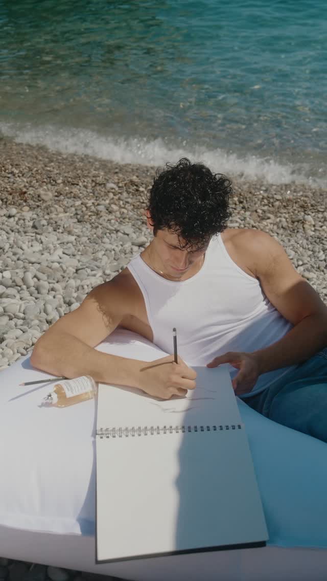 Instagram post by @angelo.mnsr for Maison Margiela Fragrances. Caption reads: a curious reminiscence of the sun’s warmth by the....