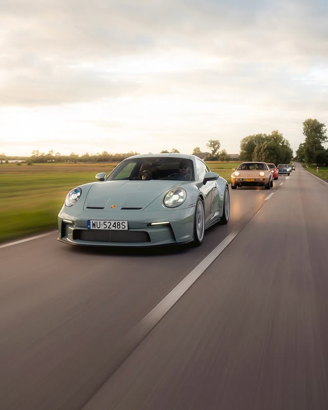 Instagram post by @skrzynski.jpg for Porsche. Caption reads: [...] cars. Happy Sportscar Together Day! By....
