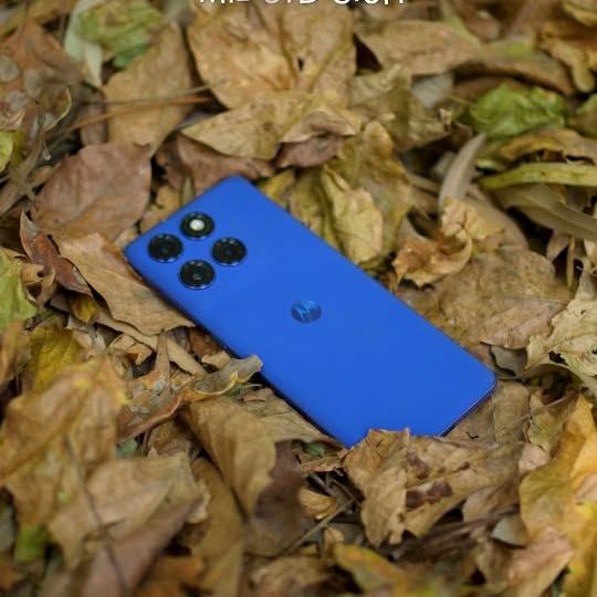 Instagram post by an influencer for Motorola India. Caption reads: Powerful Phone 💪 with Flagship Level AI 🔥🔥....