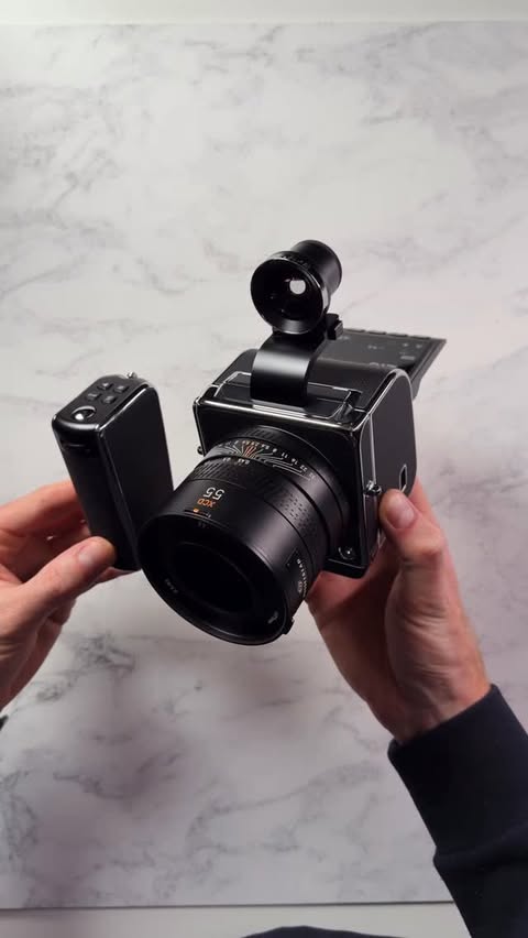 Instagram post by @chrispriestley__ for Hasselblad. Caption reads: Unboxing the @hasselblad 907X 100C - the most....