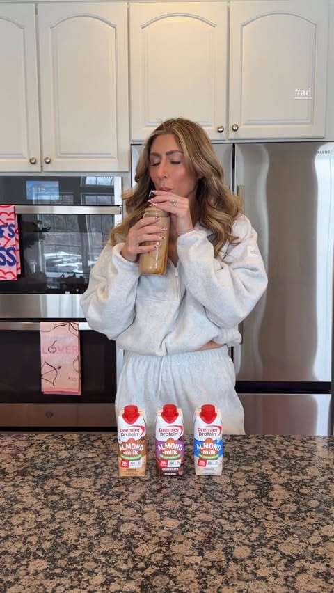 Instagram post by @samanthabauchmann for Premier Protein. Caption reads: #ad BLENDED @premierprotein ALMONDMILK ICED COFFEE....