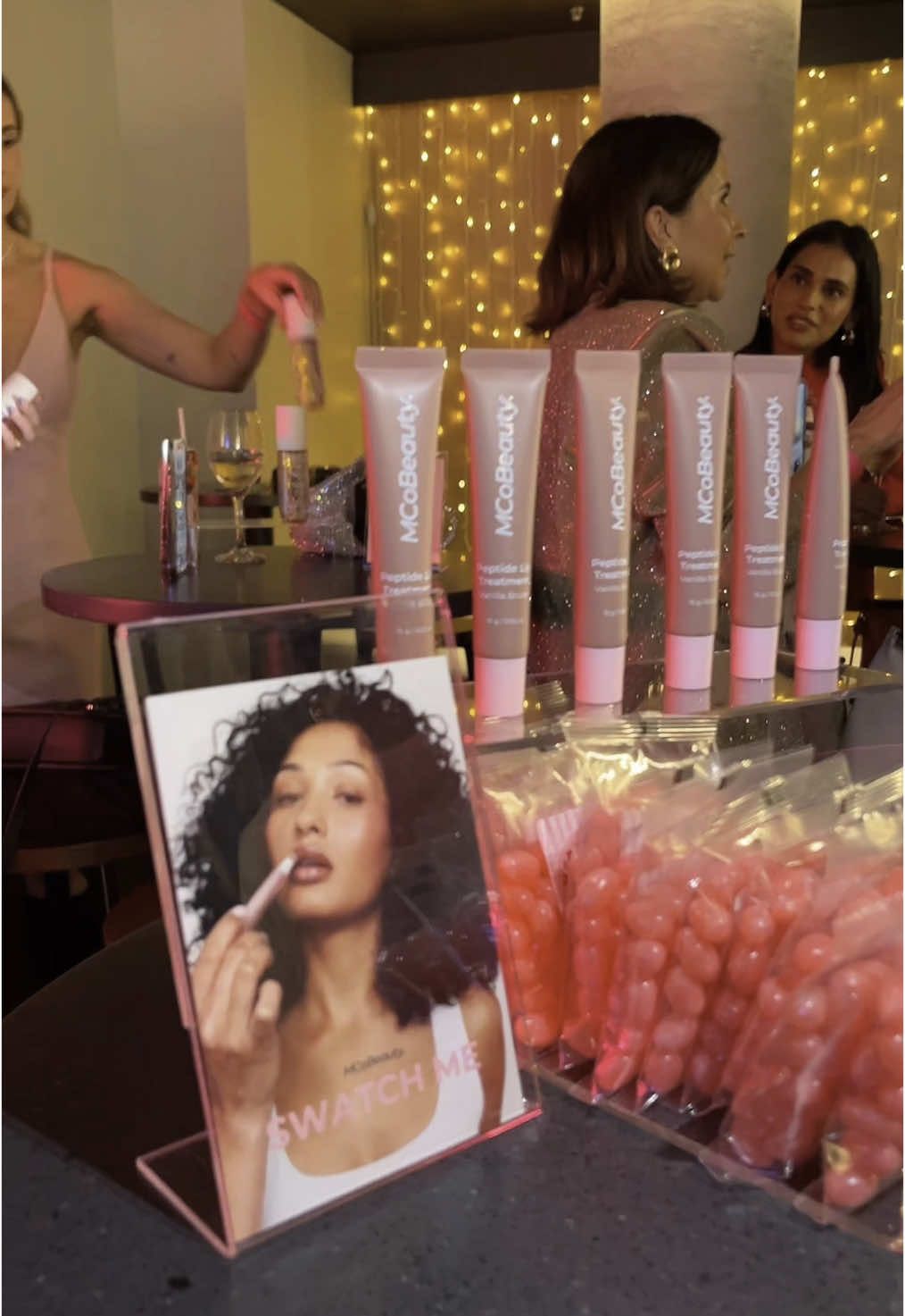 TikTok post by @rezinbarberr for MCoBeauty. Caption reads: Living a dream thanks to my besties @MCoBeauty....