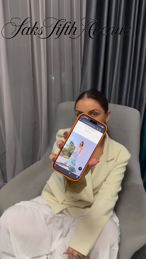 Instagram post by @aniardazishvili for Saks Fifth Avenue. Caption reads: [...] beauty, and iconic accessories at Saks Fifth....