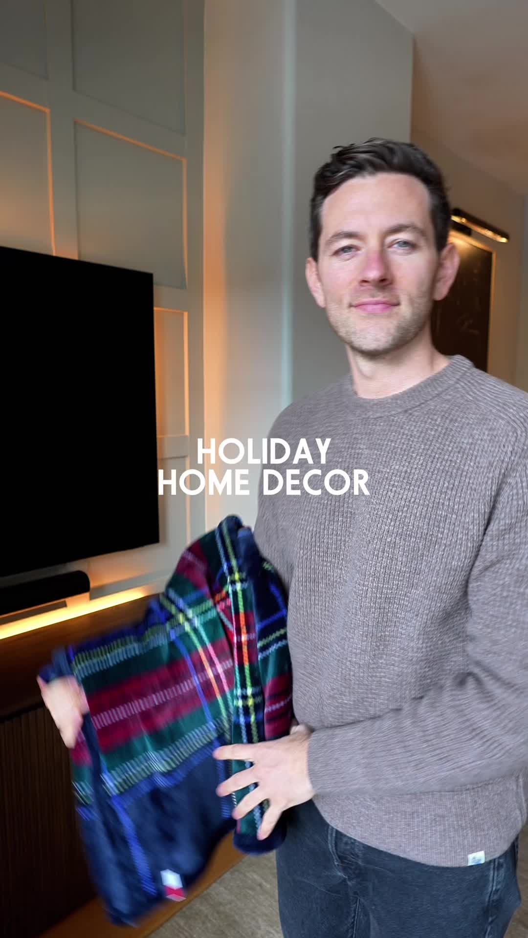 TikTok post by @bentaylor_nyc for Tommy Jeans. Caption reads: Getting holiday-ready one cozy layer at a time. 🎄....