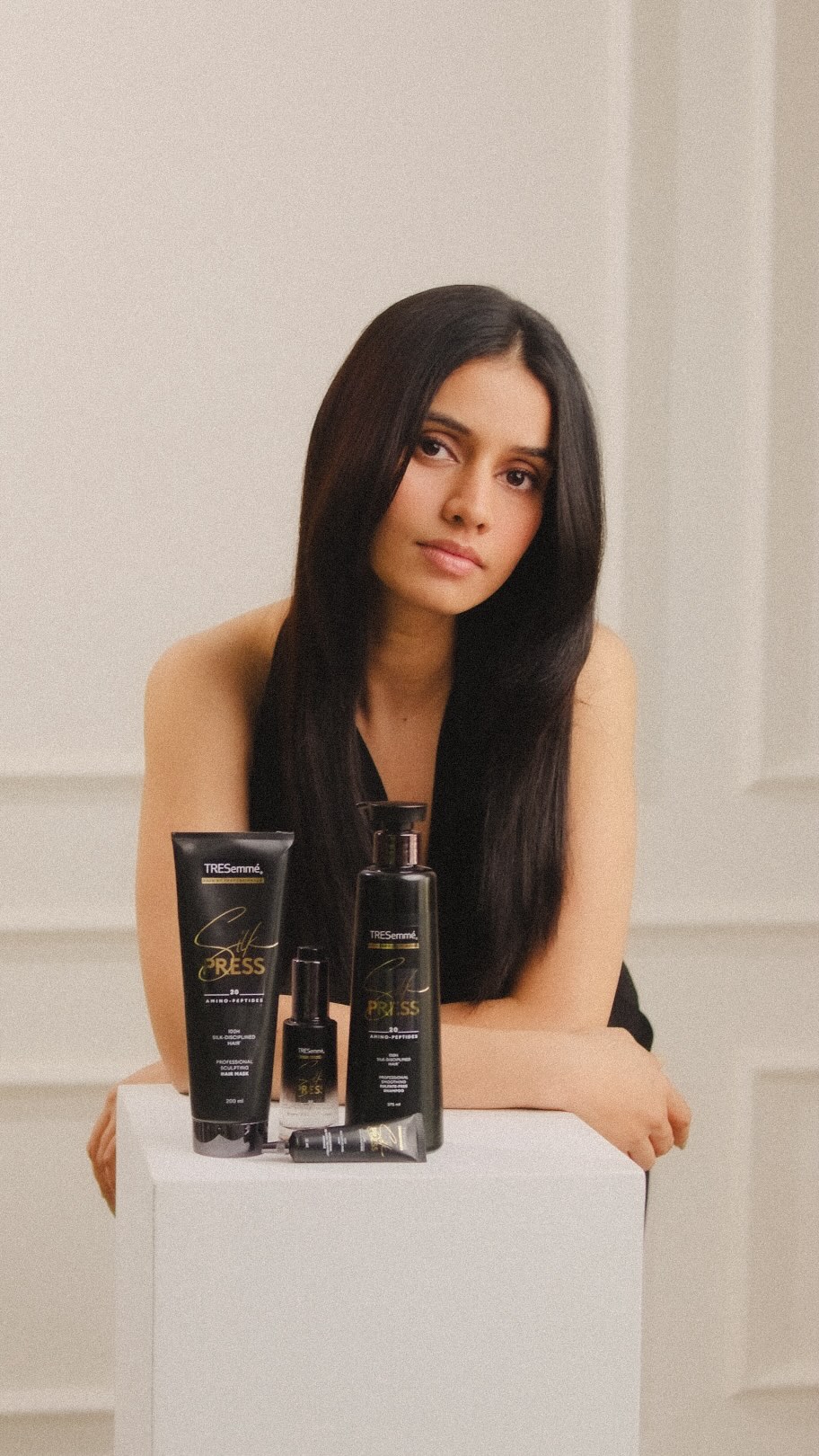 Instagram post by @mansha.karhana for TRESemmé. Caption reads: From Mansha 1.0 to Mansha 2.0, all it took was a....