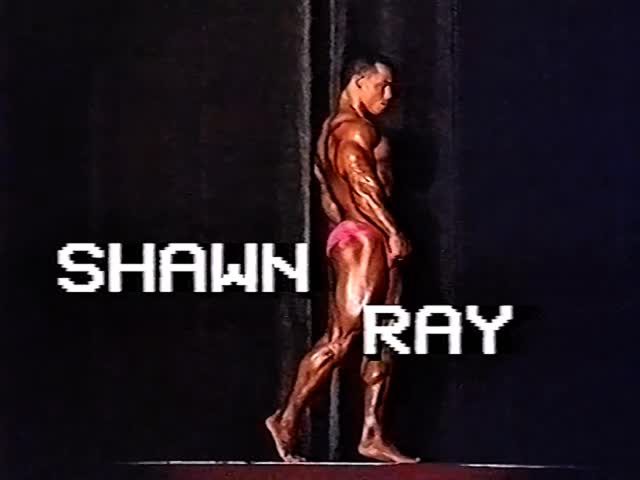Instagram post by @golden_era_of_bodybuilding for FLEX Magazine. Caption reads: @shawnrayifbbpro …1990 Germany…a masterclass in....