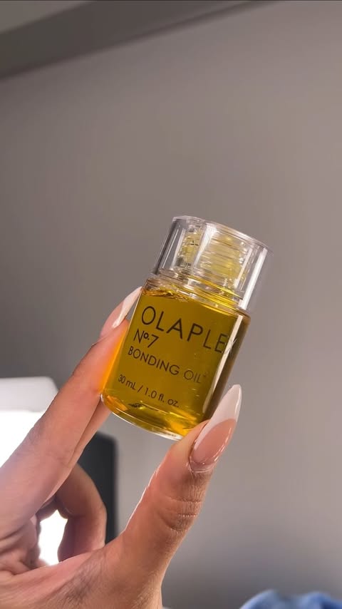 Instagram post by @alizashan for OLAPLEX. Caption reads: New Year, Same hair! #olaplexpartner Taking my....