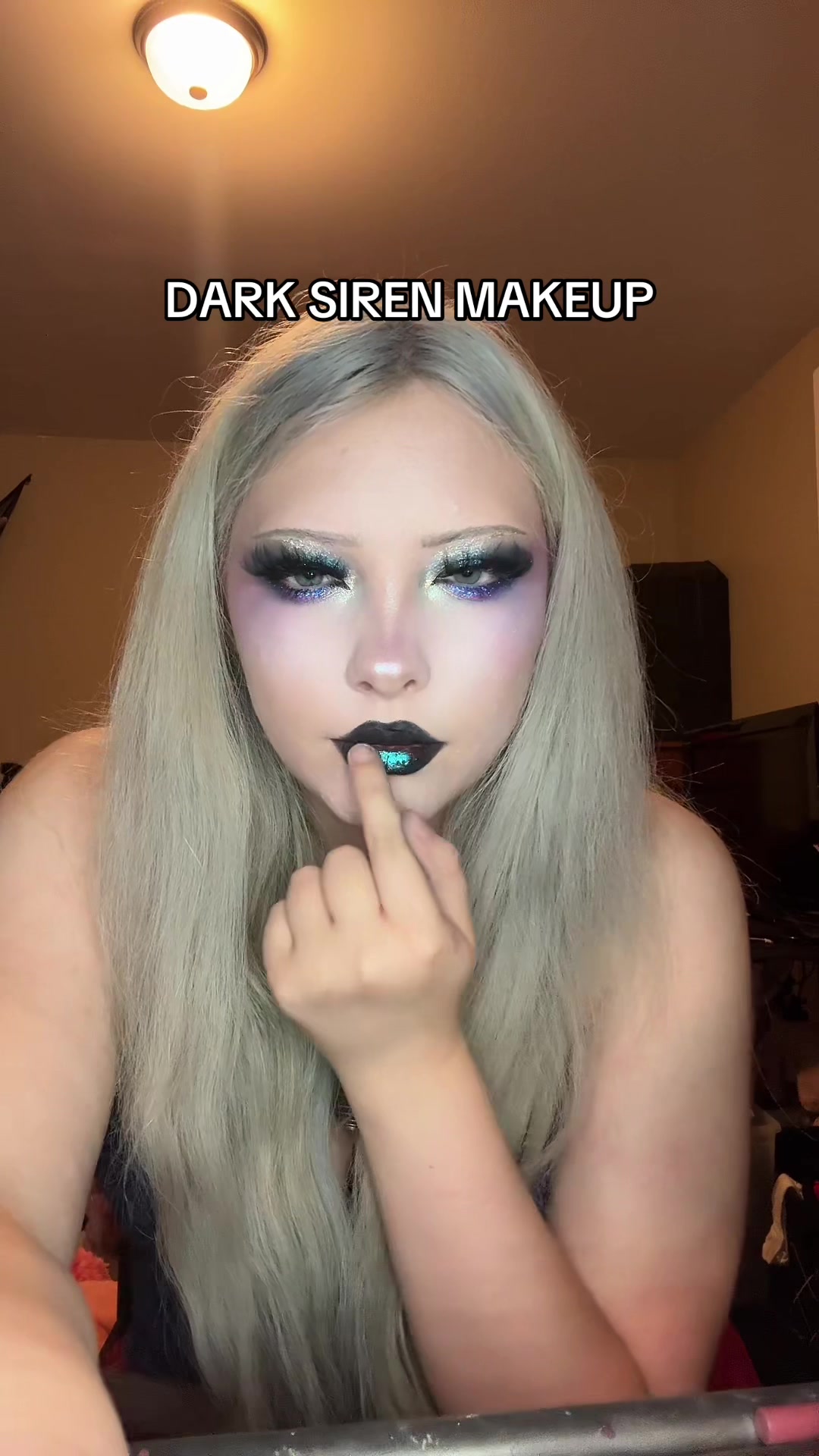 TikTok post by @autumnmarys for Adriana Nichole Cosmetics. Caption reads: product list: @rudecosmetics black eye base and....