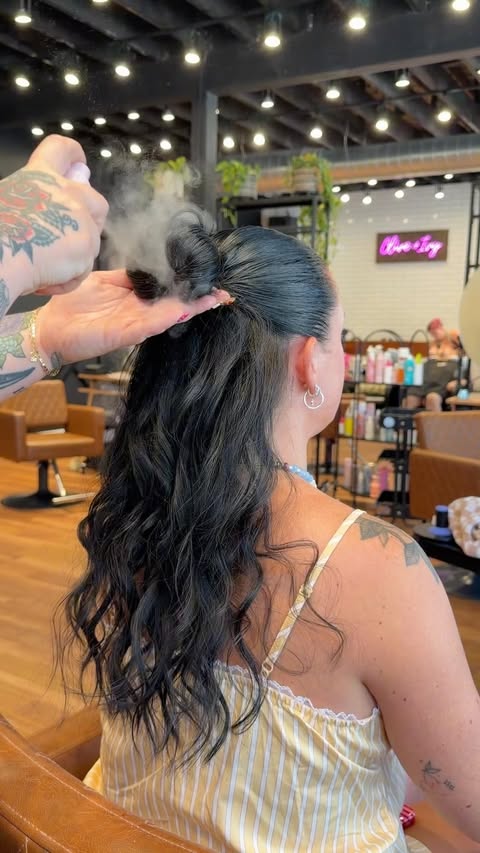 Instagram post by @mermeghair for DESIGNME Hair. Caption reads: [...] this soft, voluminous half-up look.....