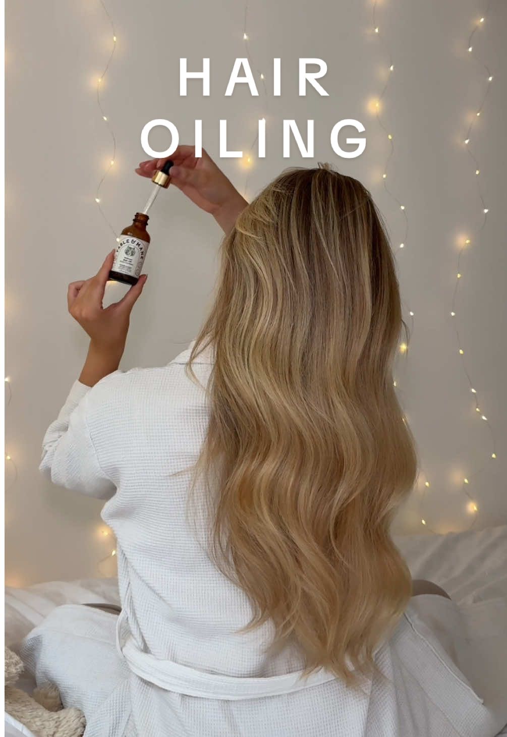 TikTok post by @sophiebarkleyy for Fable and Mane. Caption reads: If you’re not regularly hair oiling to keep your....