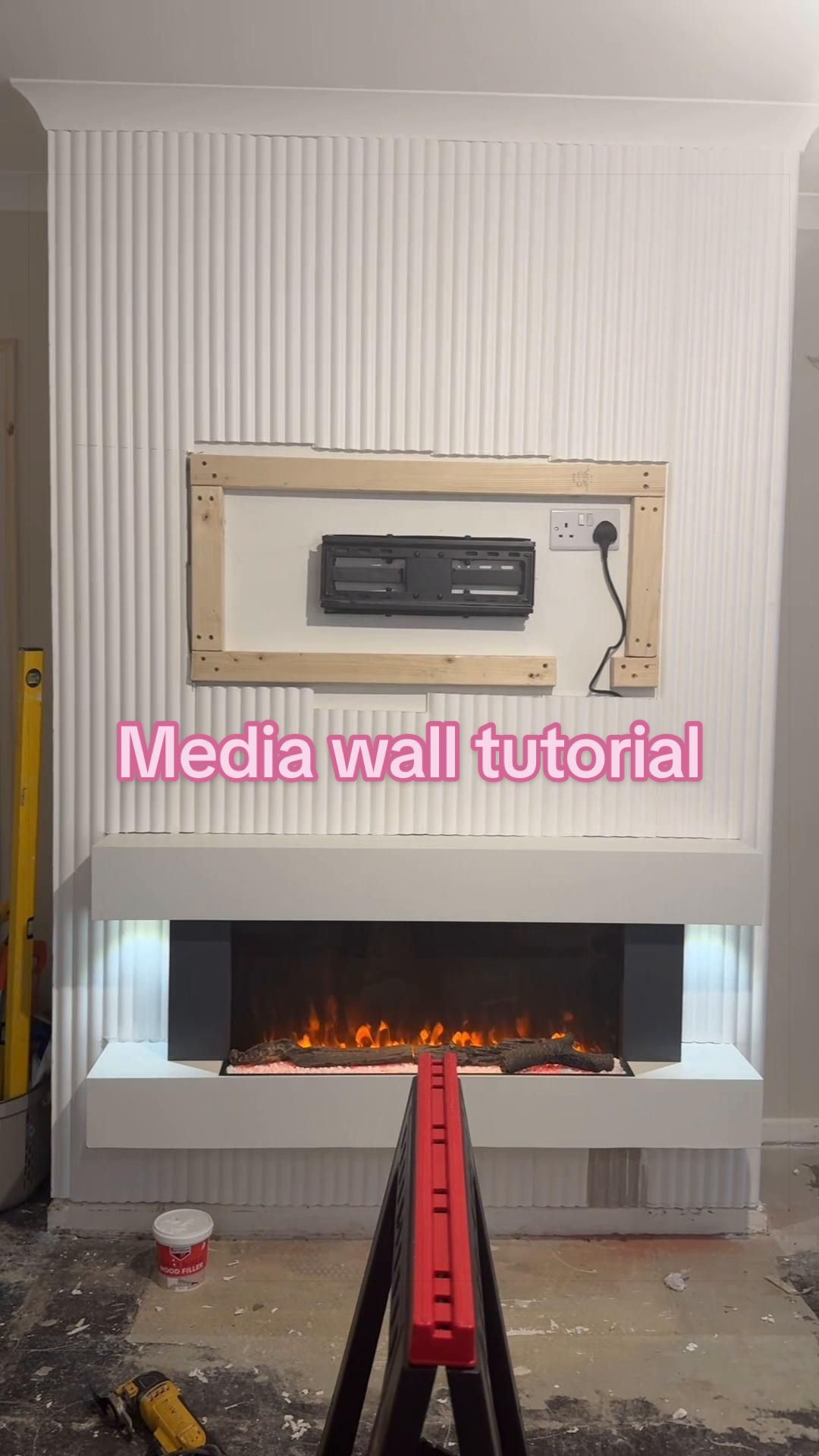 TikTok post by @hauseofbeige for Living and Home. Caption reads: [...] #fireplace @wallsandfloors @Livingandhome UK.